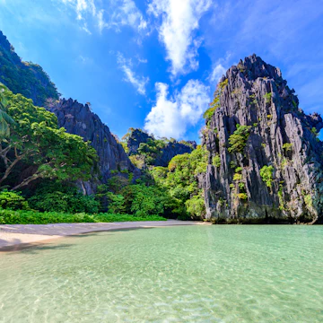Hidden beach in Matinloc Island, Philippines.