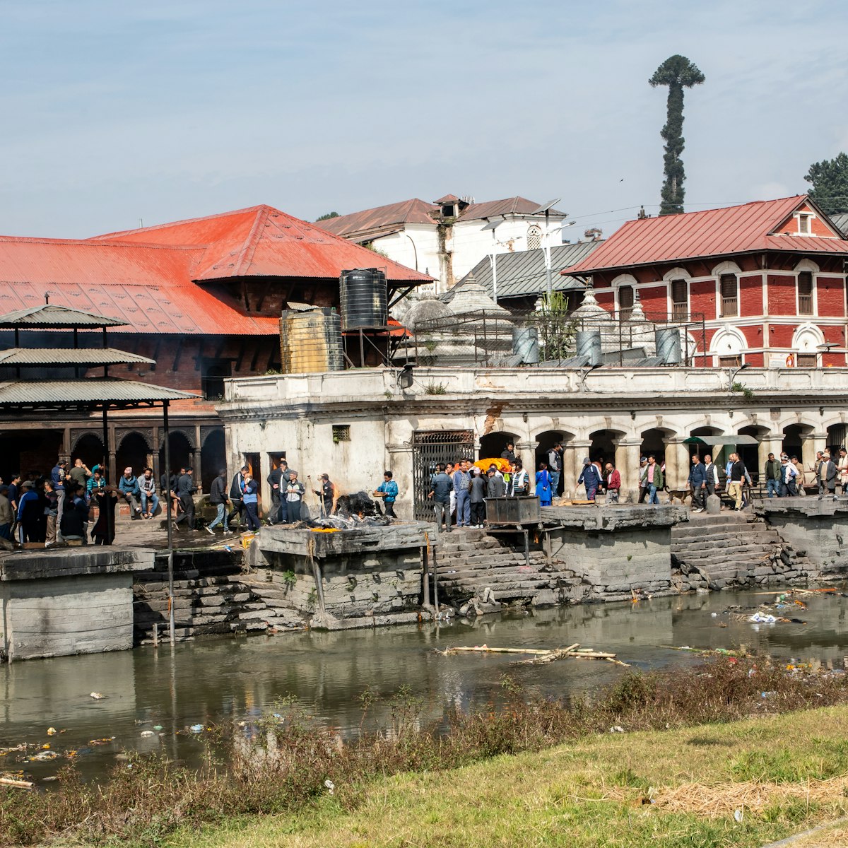 Platforms for cremations are lined up along the Bagmati River in Pashupatinah, Kathmandu, Nepal.
