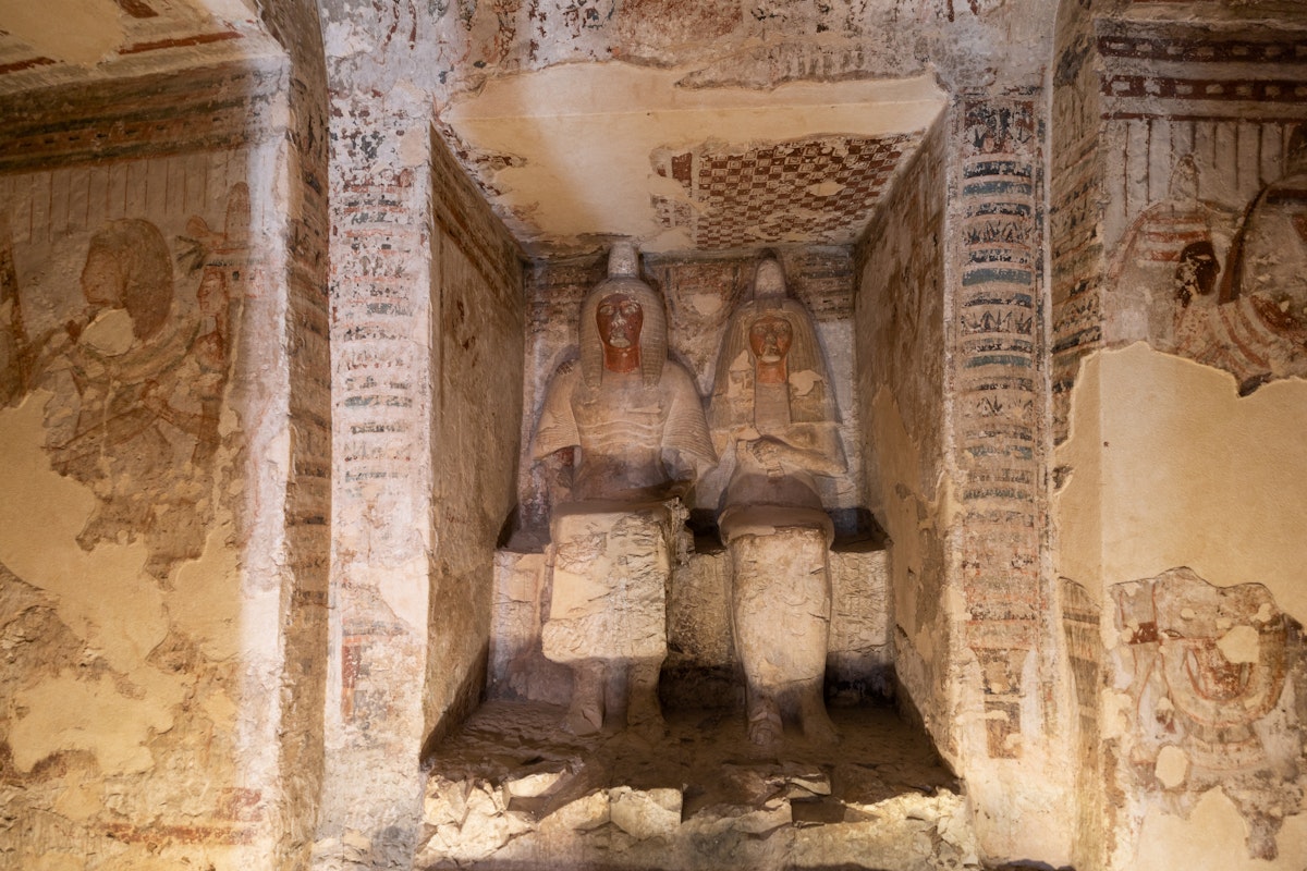 Statues of Amenemopet, the Chief Steward of Amun, and his wife in his tomb, Valley of Nobles in Thebes, Luxor, Egypt.