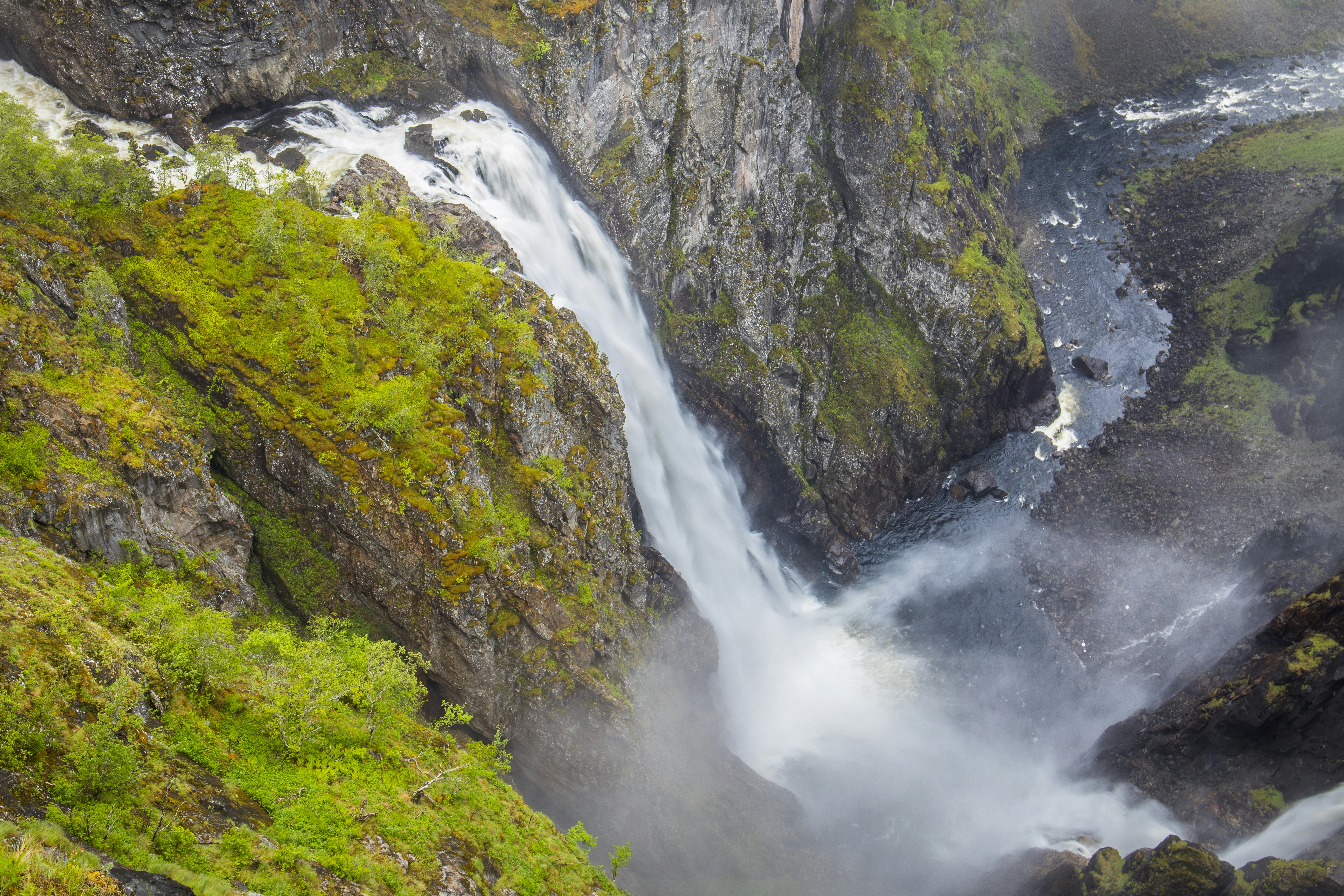 View above Vøringsfossen waterfalls during rainy weather.