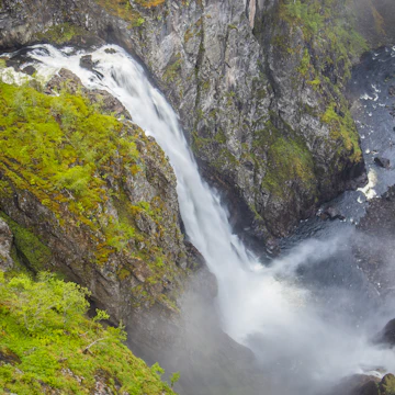 View above Vøringsfossen waterfalls during rainy weather.