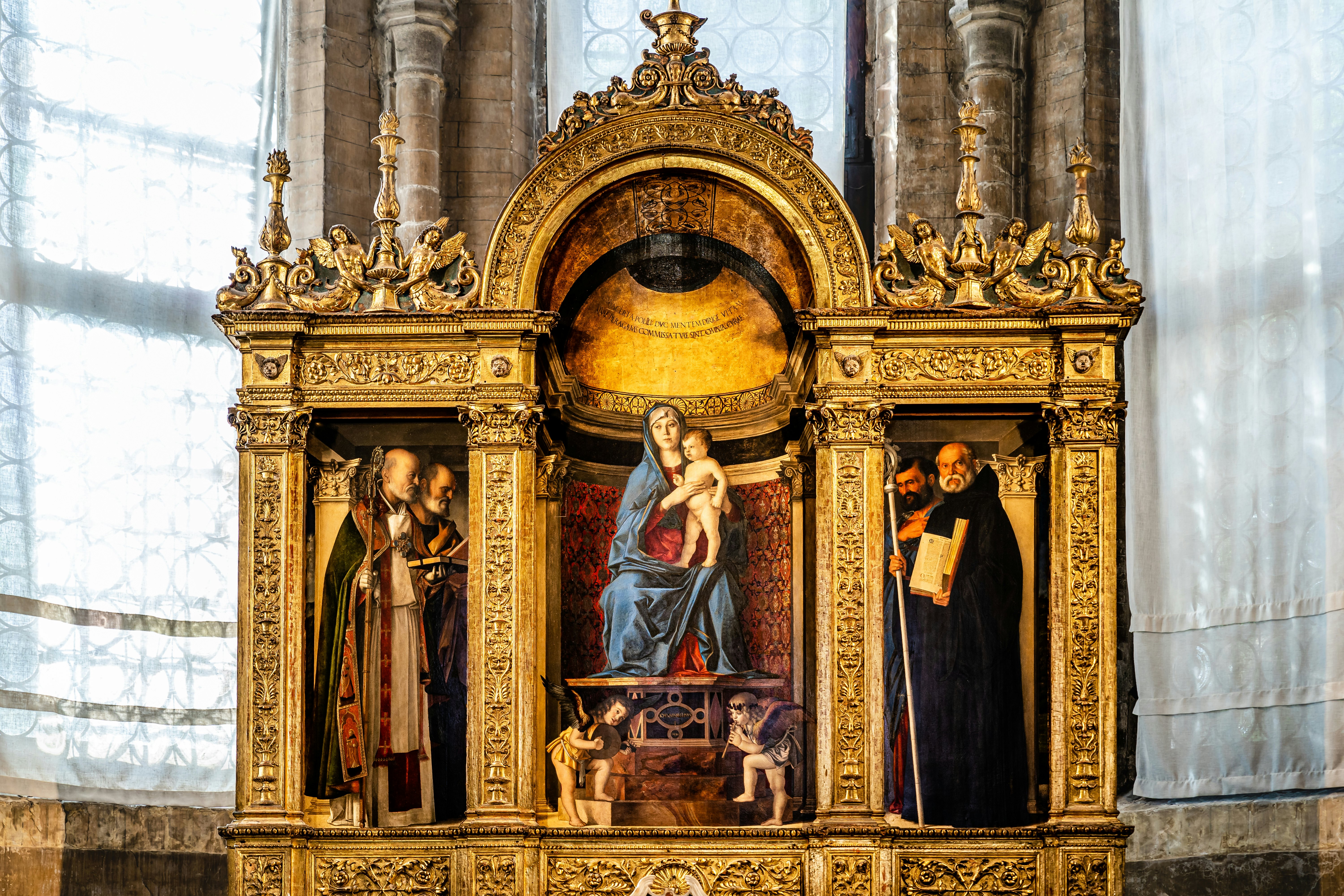Venice, Italy - November 2022: Madonna with child and saints; Frari triptych painting by Giovanni Bellini from 1488 in the Sacristy altar - Pesaro's Chapel inside the Basilica of Santa Maria Gloriosa dei Frari, Glorious St. Mary of Frari
1487677718
nicholas, peter, saint benedict, saint peter, heritage, mark, saint nicholas, frari, saint mary, madonna, madonna with child, st. mark, st. benedict, sacristy, saint mark, giovanni bellini, benedict