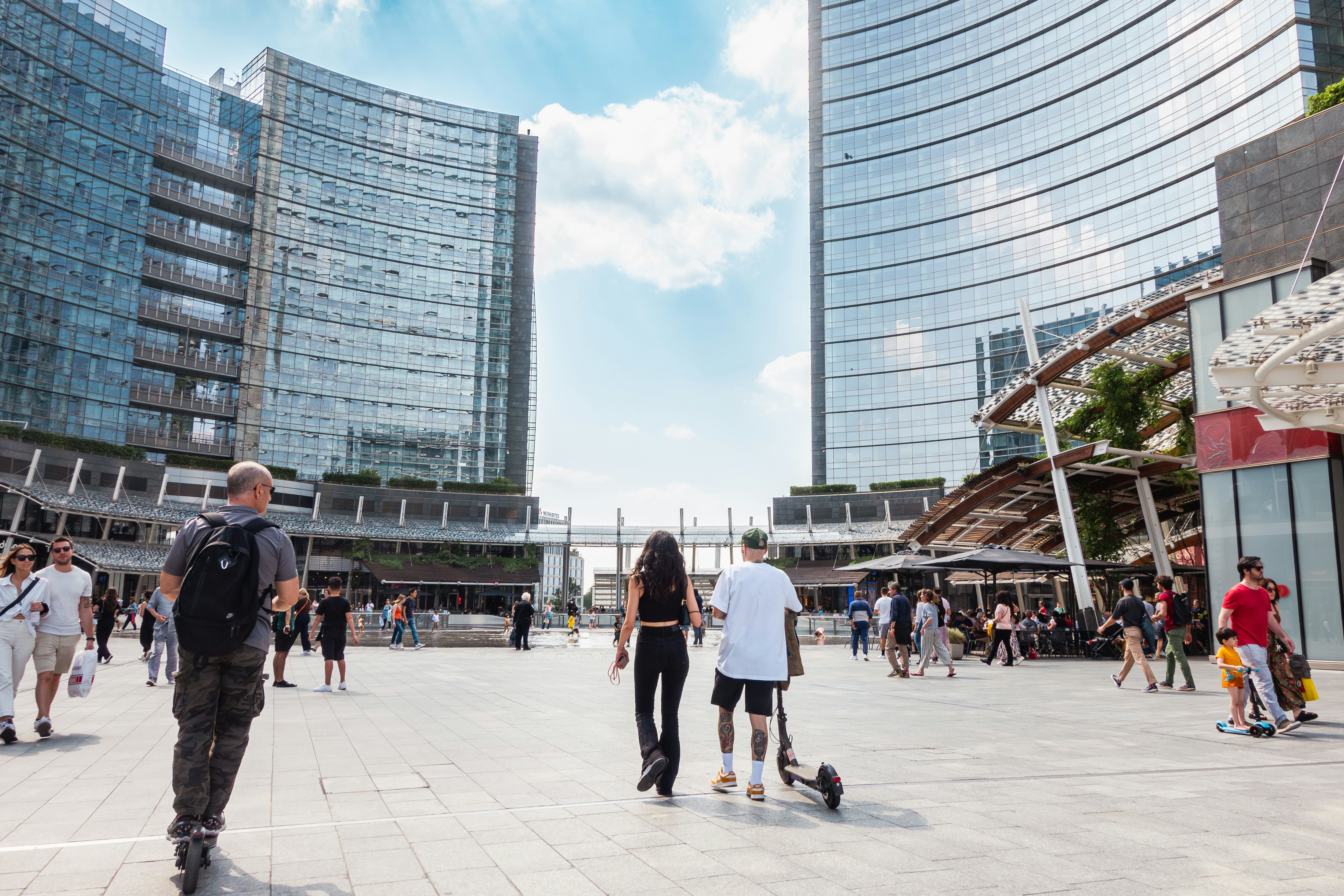 Milan, Gae Aulenti square, people on electric push scooter. Pedestrian zone in modern Milan square with glass buildings and people on electric scooters
1494064400
strolling, editorial, aulenti, beautiful, blue sky, building, center, destinations, gae, landmark, milano, tourists, urban, italian, square, porta nuova
