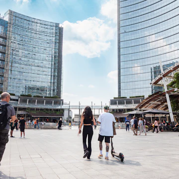 Milan, Gae Aulenti square, people on electric push scooter. Pedestrian zone in modern Milan square with glass buildings and people on electric scooters
1494064400
strolling, editorial, aulenti, beautiful, blue sky, building, center, destinations, gae, landmark, milano, tourists, urban, italian, square, porta nuova