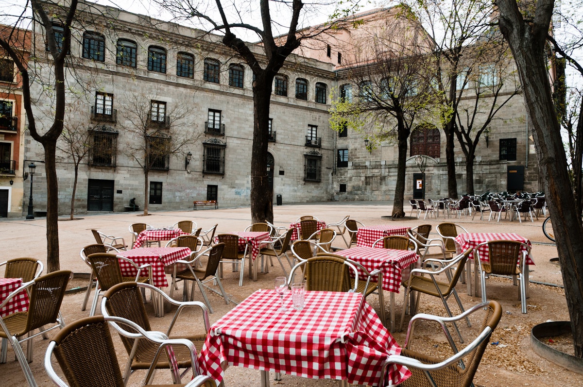 Restaurant tables in Plaza de la Paja, Madrid, Spain.
