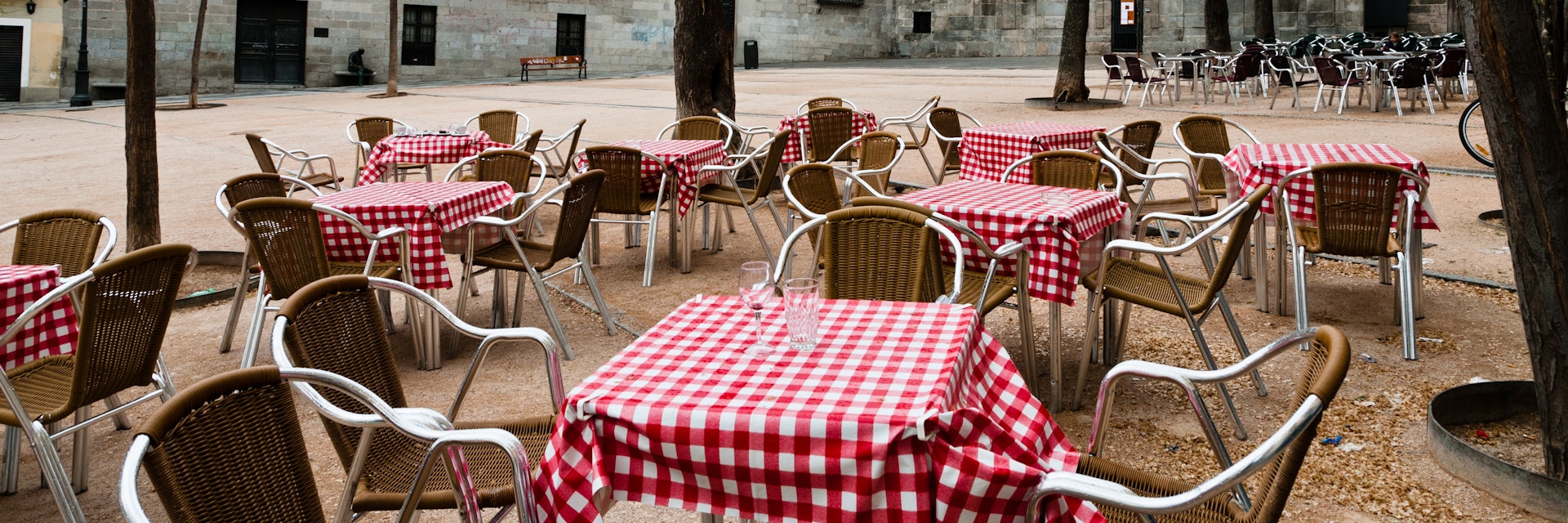 Restaurant tables in Plaza de la Paja, Madrid, Spain.