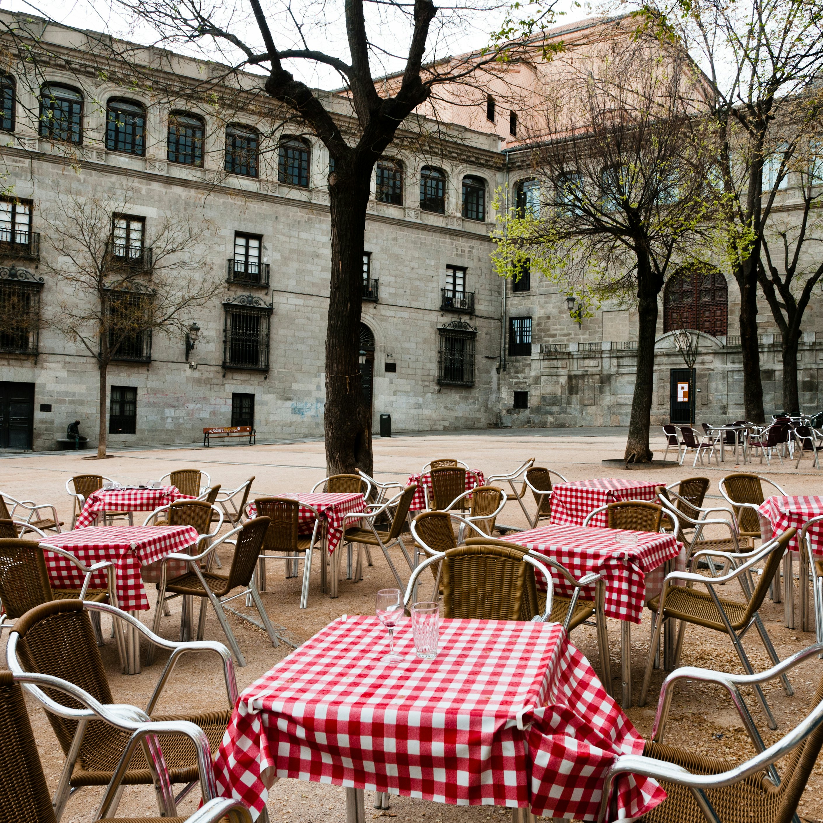 Restaurant tables in Plaza de la Paja, Madrid, Spain.