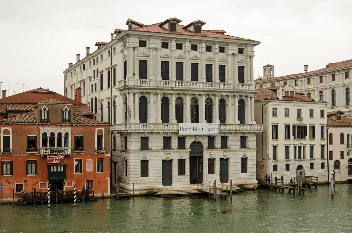 Venice, Italy - May 22, 2015: View across the Grand Canal of the new art gallery Fondazione Prada in Venice, Italy.  On a rainy day in May.
477533506
Prada, Building Exterior, Overcast, Art, Art Museum, Urban Scene, Outdoors, Horizontal, Image, Grand Canal - Venice, Venice - Italy, Veneto, Italy, Springtime, Rain, Water, Canal, City, Nautical Vessel, May