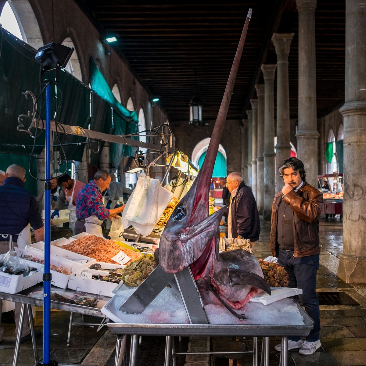 Venice, Italy - 5 April 2016:  Fishmongers set up their stalls with a variety of fresh fish, including giant swordfish, at the Rialto fish market, Venice, Italy
519462692
European Culture, Tourism, Men, Fame, Fish Vendor, Color Image, Swordfish, Prepared Fish, Swordfish, Trading, Market Stall, History, Freshness, Colors, International Landmark, Famous Place, Travel Destinations, Urban Scene, Trader, People, Rialto Bridge, Venice - Italy, Italy, Europe, Fish, Market, City, Seafood, Food