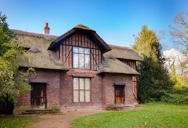 Thatched Queen Charlotte's Cottage at Kew Gardens botanical garden.