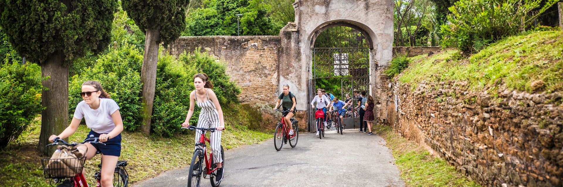 ROME, ITALY - May 2018: Cycling people at the entrance gate to the Catacombe di San Callisto cave historical town in Rome, Italy; Shutterstock ID 1301255716; purchase_order: 65050; job: poi; client: ; other:
1301255716