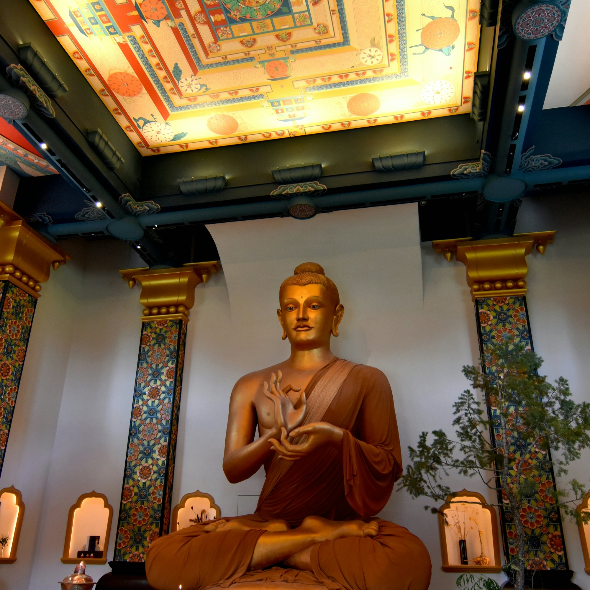 Red Feather Lakes, Colorado - July 9, 2019 : A large golden Buddha inside the Great Stupa of Dharmakaya. The stupa was built in 1988 in the mountains of Colorado.; Shutterstock ID 1454934947; purchase_order: 65050; job: ; client: ; other:
1454934947