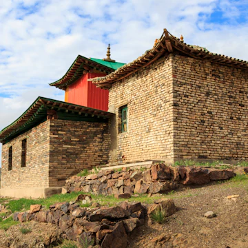 Ongiin Khiid, Saikhan Ovoo, Mongolia - 07 19 15: Buddhist Ongiin Khiid temple building at the monastery ruins of Ongiin Khiid which is a tourist attraction in the remote Gobi of Mongolia; Shutterstock ID 1883979241; purchase_order: 65050; job: ; client: ; other:
1883979241
