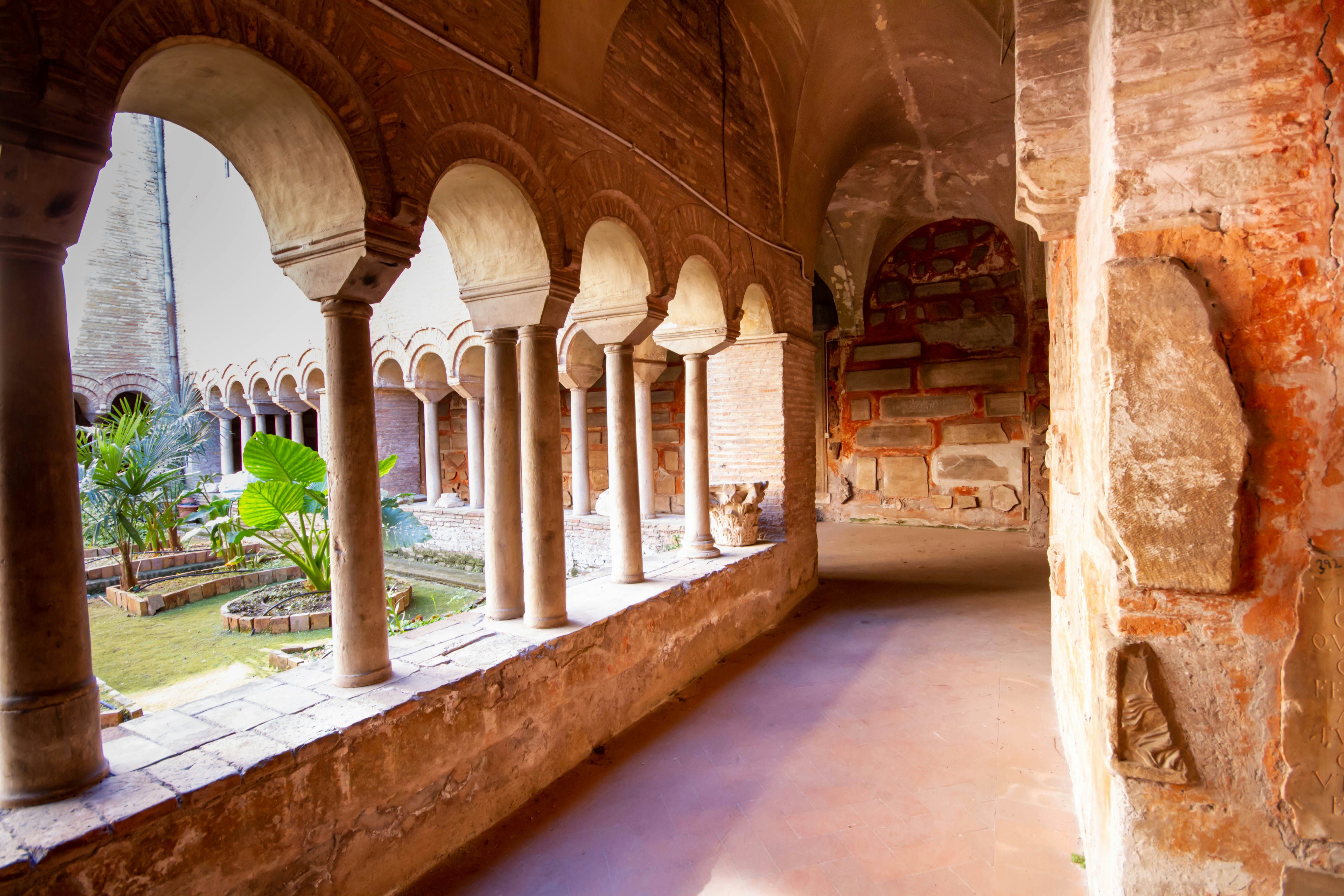 Rome, Italy- April 8,2021: The Cloister of The Basilica of San Lorenzo fuori le Mura.A square corridor built in the 12th century,Numerous sarcophagi and bas-reliefs are arranged along the walls; Shutterstock ID 1954131592; purchase_order: 65050; job: poi; client: ; other:
1954131592