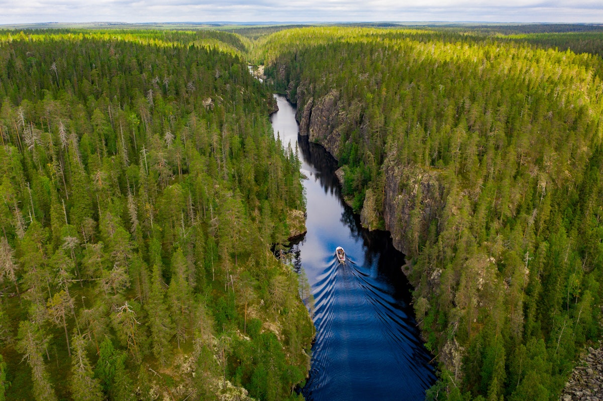 Aerial view of a boat, canyon lake and forest in Julma-Ölkky, Hossa National Park, Finland; Shutterstock ID 2023369706; purchase_order: 65050; job: ; client: ; other:
2023369706