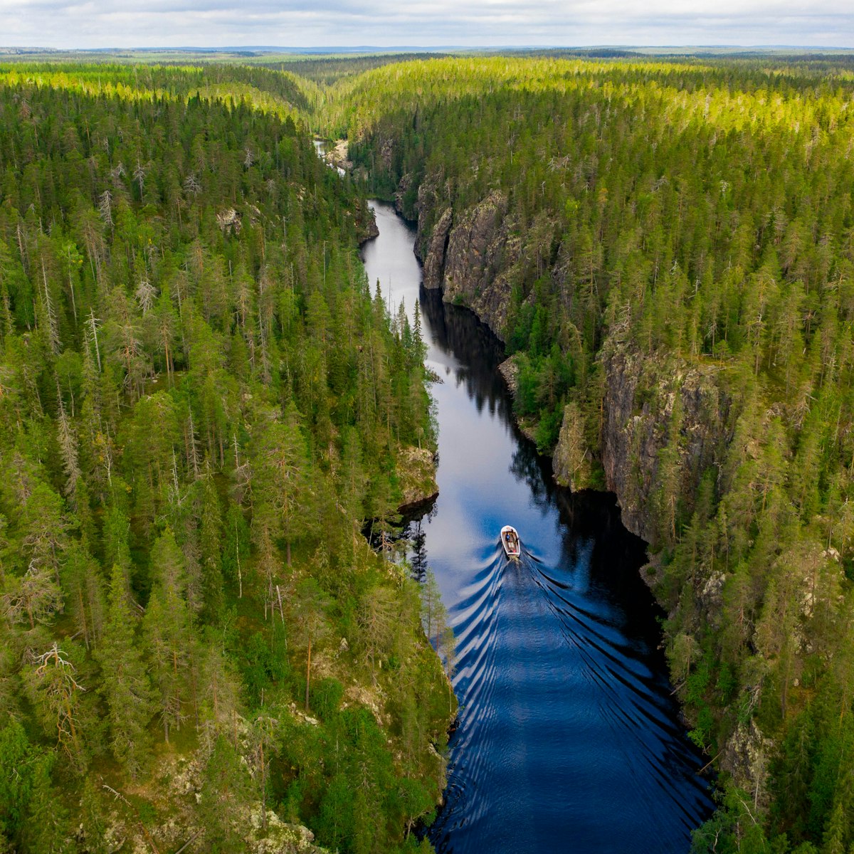 Aerial view of a boat, canyon lake and forest in Julma-Ölkky, Hossa National Park, Finland; Shutterstock ID 2023369706; purchase_order: 65050; job: ; client: ; other:
2023369706