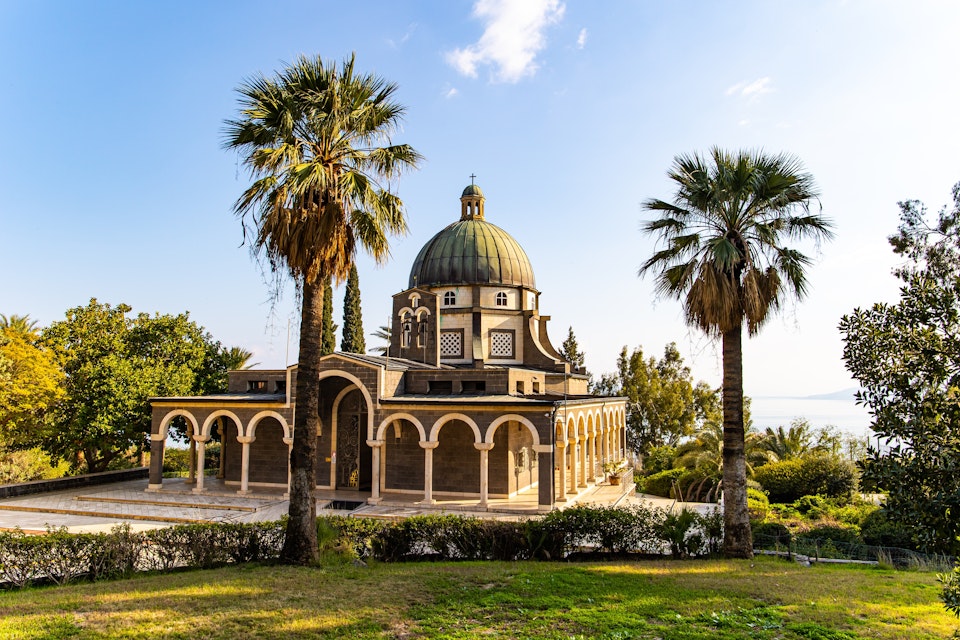 Magnificent monastery surrounded by columns and slender tall palms and cypresses. The Church of the Beatitudes is a Catholic church of the Italian Franciscan convent on the Mount of Beatitudes. ; Shutterstock ID 2170188309; purchase_order: 65050; job: ; client: ; other:
2170188309