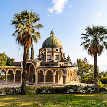 Magnificent monastery surrounded by columns and slender tall palms and cypresses. The Church of the Beatitudes is a Catholic church of the Italian Franciscan convent on the Mount of Beatitudes. ; Shutterstock ID 2170188309; purchase_order: 65050; job: ; client: ; other:
2170188309