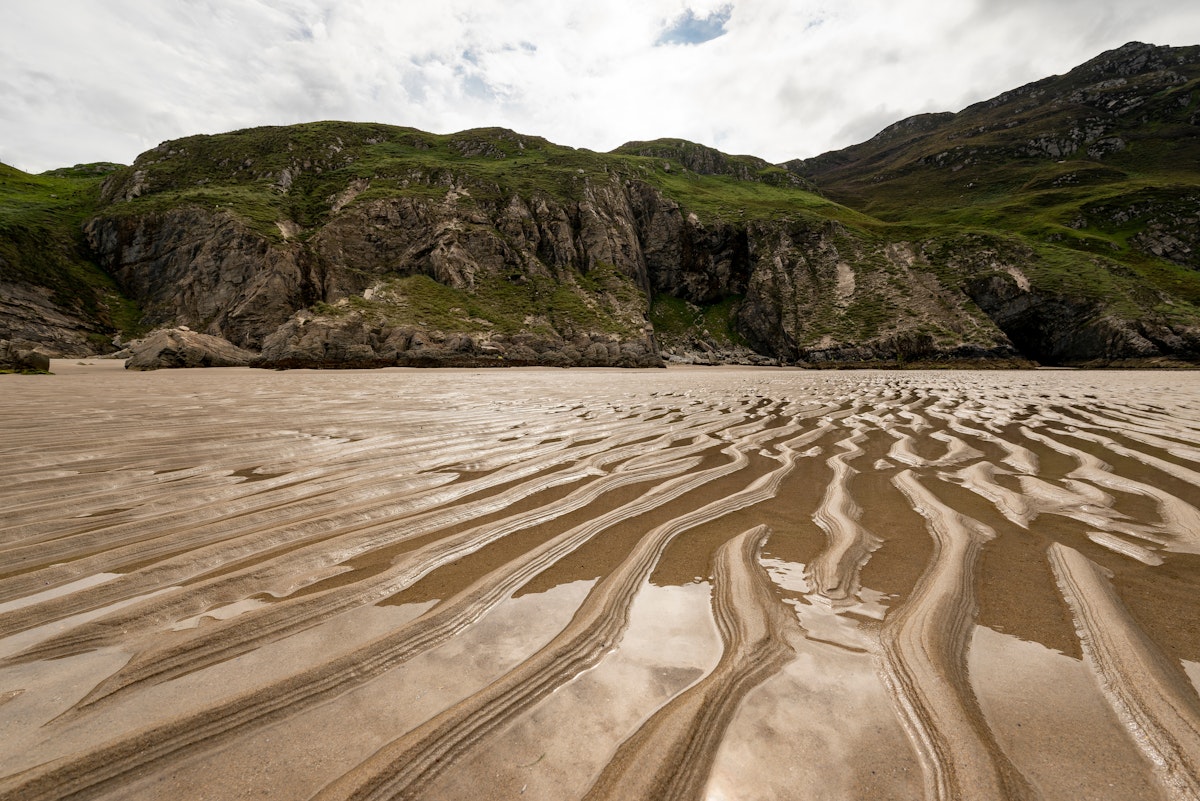 Close-up of the wavy sand at Maghera beach at ebb tide, County Donegal, Ireland; Shutterstock ID 2286569939; purchase_order: 65050; job: ; client: ; other:
2286569939