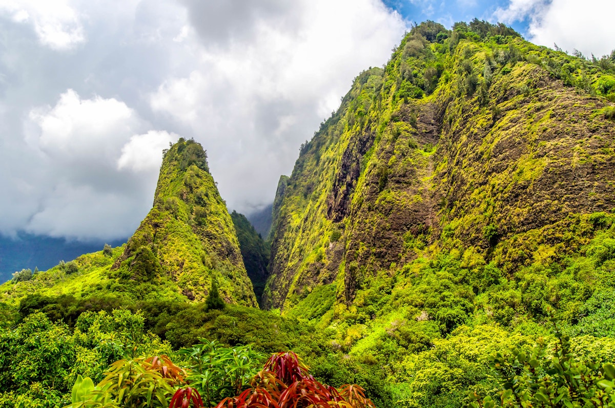 The towering monolith covered in tropical plant life known as the 'lao Needle in the West Maui Mountains, Hawaii.; Shutterstock ID 388732213; purchase_order: 65050; job: ; client: ; other:
388732213