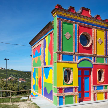 Cappella del Barolo, a little colorful church on a summer's day.