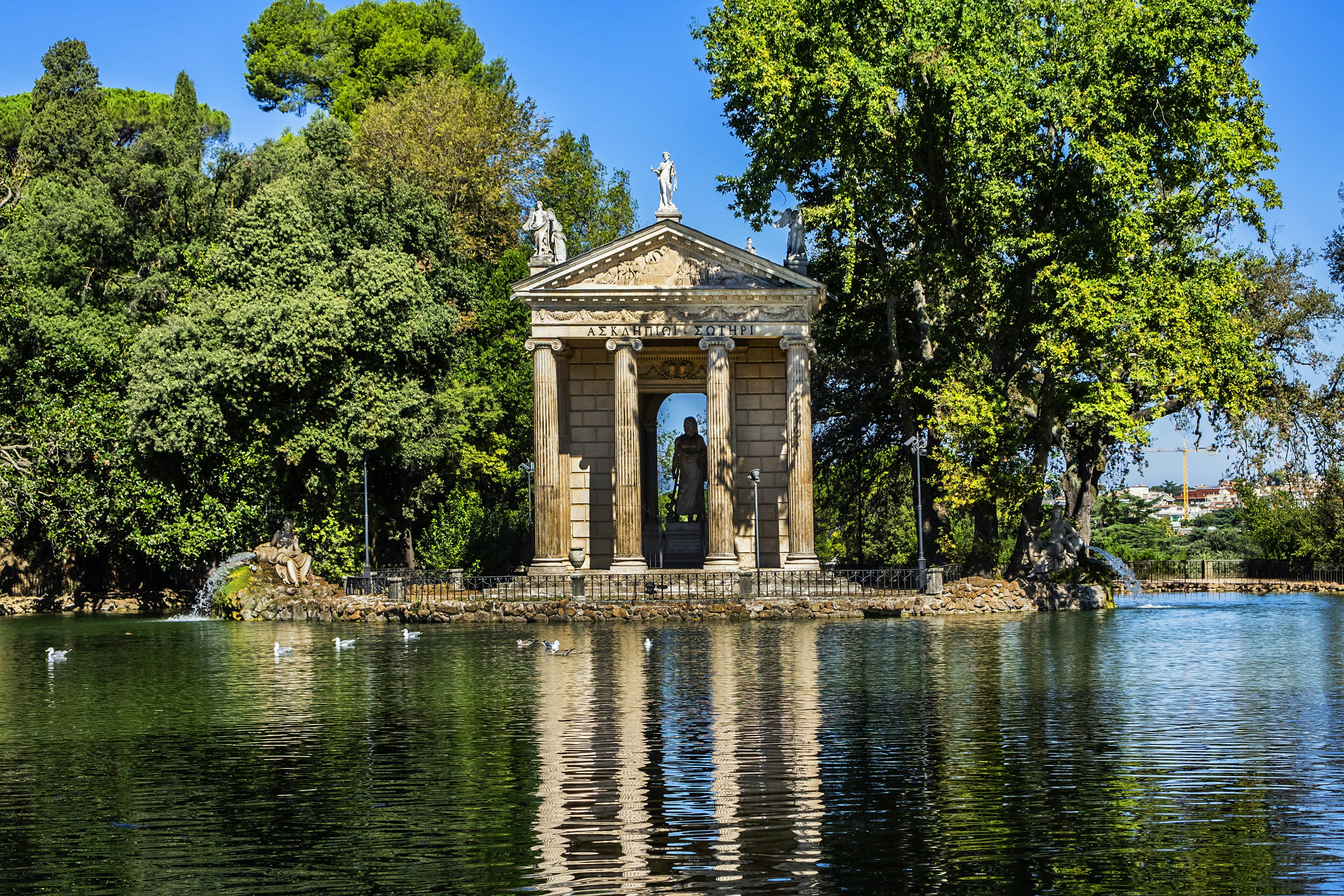 The lakeside Temple of Aesculapius in in the gardens of the Villa Borghese.
1168486960
ancient, architecture, art, attraction, capital, classical, culture, european, famous, gardens, historical, history, holiday, italia, italian, italy, landmark, monument, old, place, roma, roman, rome, sculpture, sightseeing, stone, temple, tourism, tourist, touristic, travel, vacation, villa borghese