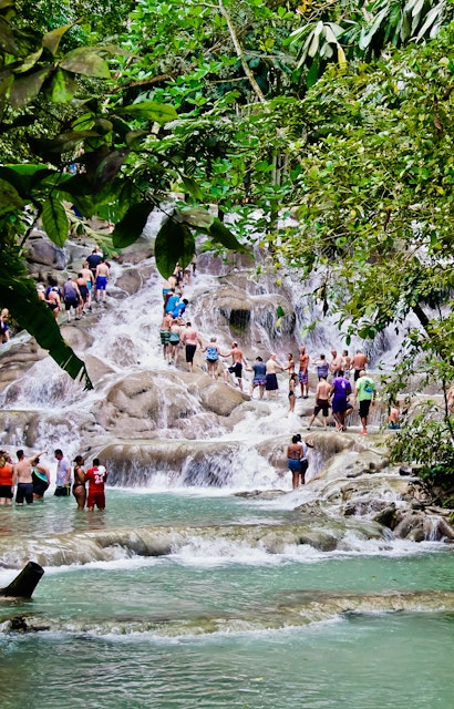 January 31, 2019: Tourists climbing the rocky terrace of Dunn’s River Falls.
1420942997
adventure, american, beautiful, caribbean, climbing, culture, dunn's river falls, environment, falls, family, flow, forest, fun, green, hand holding, jamaica, jungle, kids, landscape, lifestyle, man, nature, ocho rios, outdoor, people, plant, recreation, river, rock, rocky, saint ann, scenery, scenic, season, sport, tourism, tourist, travel, tree, vacation, vertical, view, wading, walking, water, waterfalls, white, winter, women, work