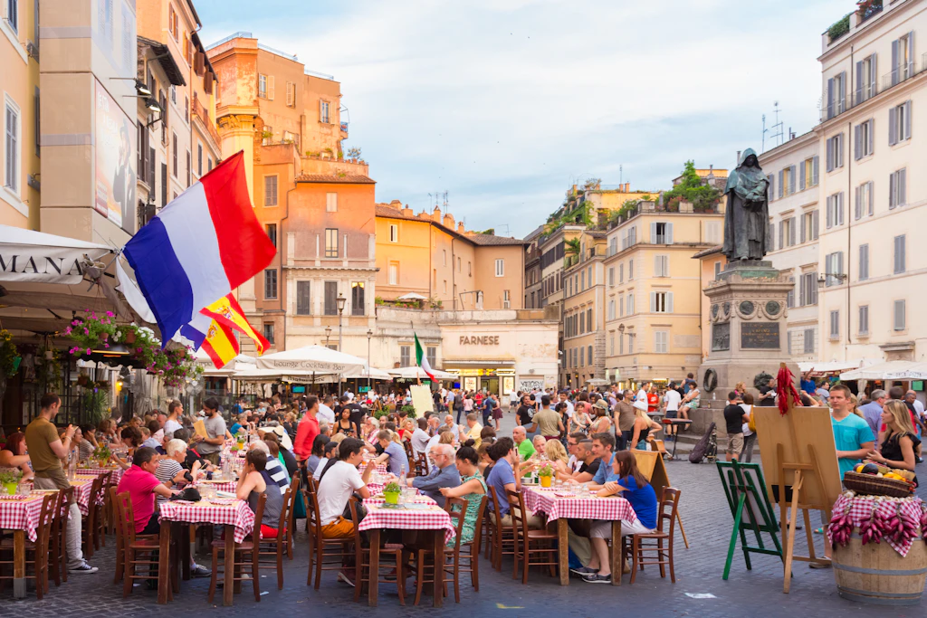 Dining out, Campo de' Fiori, Rome People sit at outside tables in a city square