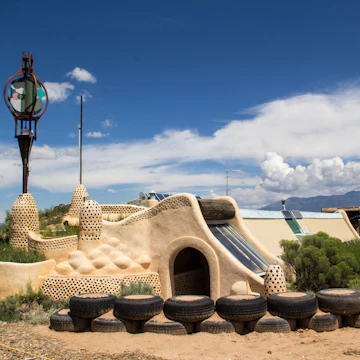 TAOS, NEW MEXICO-AUGUST 13: Building materials sit outside an earthship being built in Taos on August 13, 2014. Earthships are environmentally friendly homes made of recycled materials.
210755425
unusual, usa, bottles, green, abode, earth, community, new, recycling, utilization, recycle, ecology, tires, living, nm, adobe, building, cistern, artsy, energy, solar, efficient, architecture, mexico, home, sustainable, house, art, space, environment, structure, innovative, cutting edge, greater world earthship community, earthship, biotecture, unusual, america, usa, bottles, green, abode, earth, community, new, recycling, utilization, recycle, ecology, tires, living, nm, adobe, building, cistern, artsy, energy, solar, efficient, architecture, mexico, home, sustainable, house, art, space, environment, structure, innovative, cutting edge, greater world earthship community, earthship, biotecture