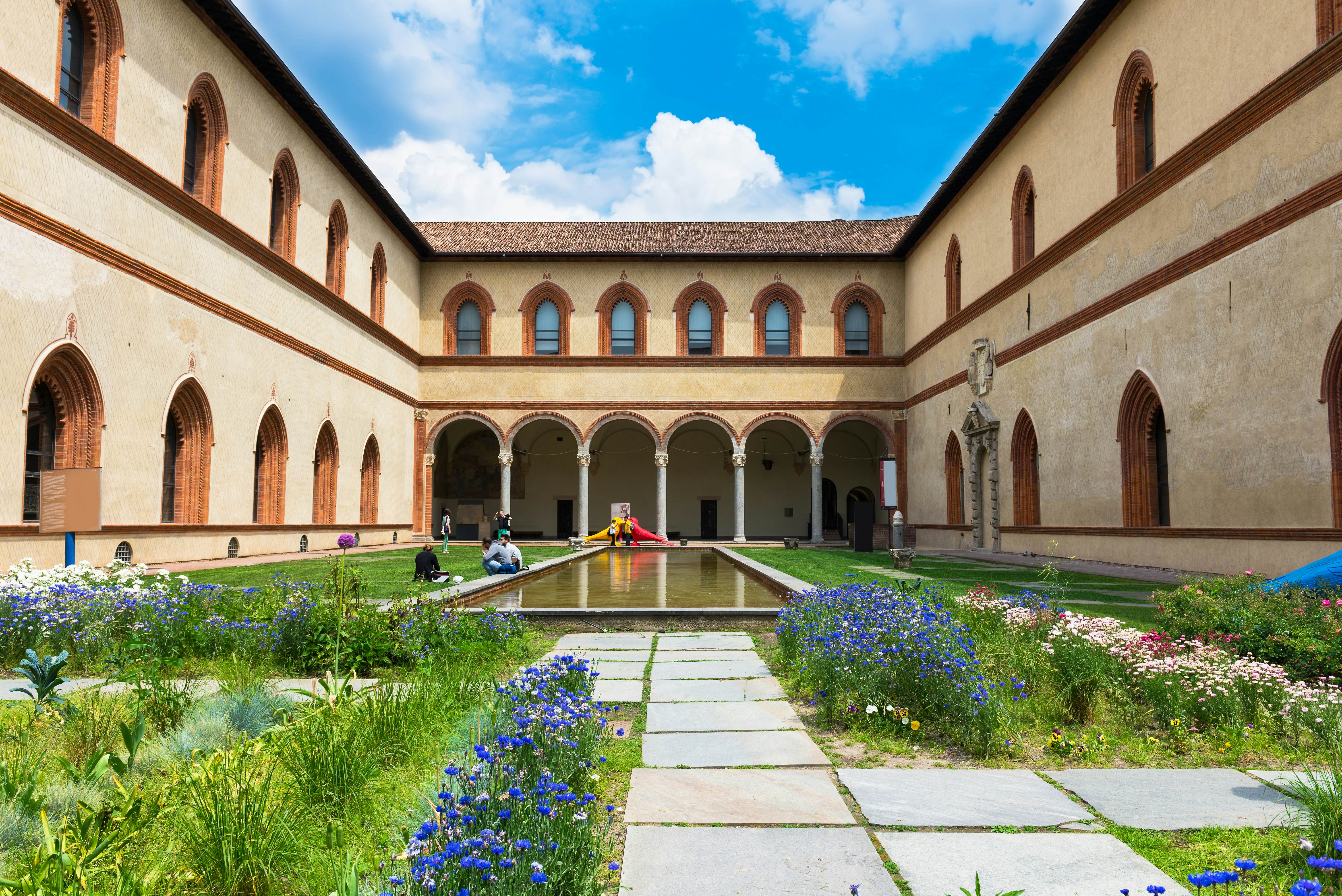 The courtyard of Sforza Castle (Castello Sforzesco) in Milan.
220842892
italian, arch, medieval, italy, arched, european, landmark, attraction, castle, milan, palace, entrance, old, building, dark, historic, lombardy, center, architecture, city, masterpiece, blue, classic, art, master, antique, ancient, water, monument, fountain, facade, lights, centre, sforza, castello, milano, sforzesco