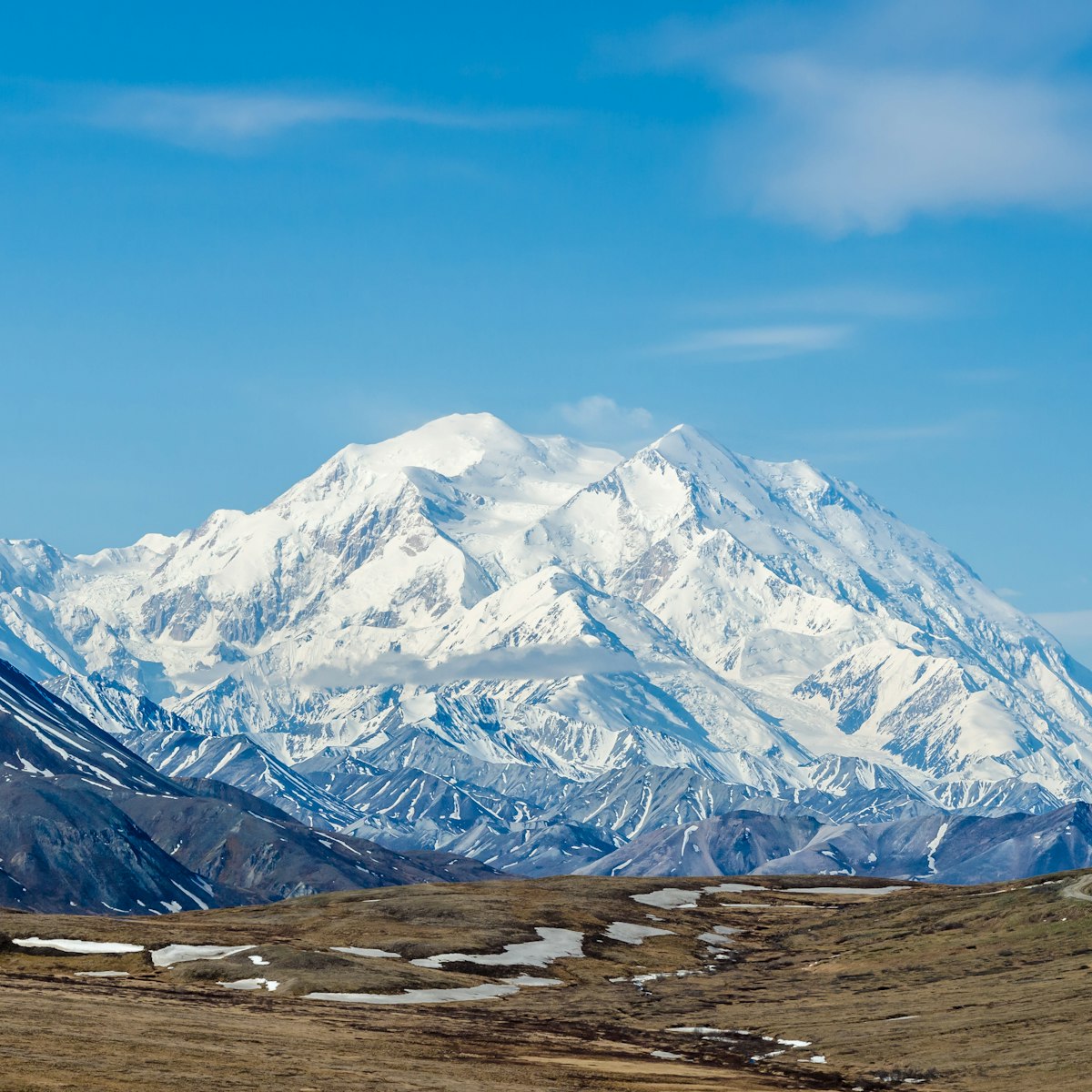 DENALI NATIONAL PARK, ALASKA, USA - JUNE 9 2013: Mt McKinley on a clear day on June 9 2013 in Alaska.  Mt McKinley is the highest mountain in North America and on August 28 2015 was renamed to Denali.
389540554
outdoor, snowy, clear, natural, park, national, day, dramatic, glacier, summer, tundra, denali, range, mckinley, mt, blue, wilderness, mountain, sky, scenic, snow, wild, nature, pretty, alaska, landscape