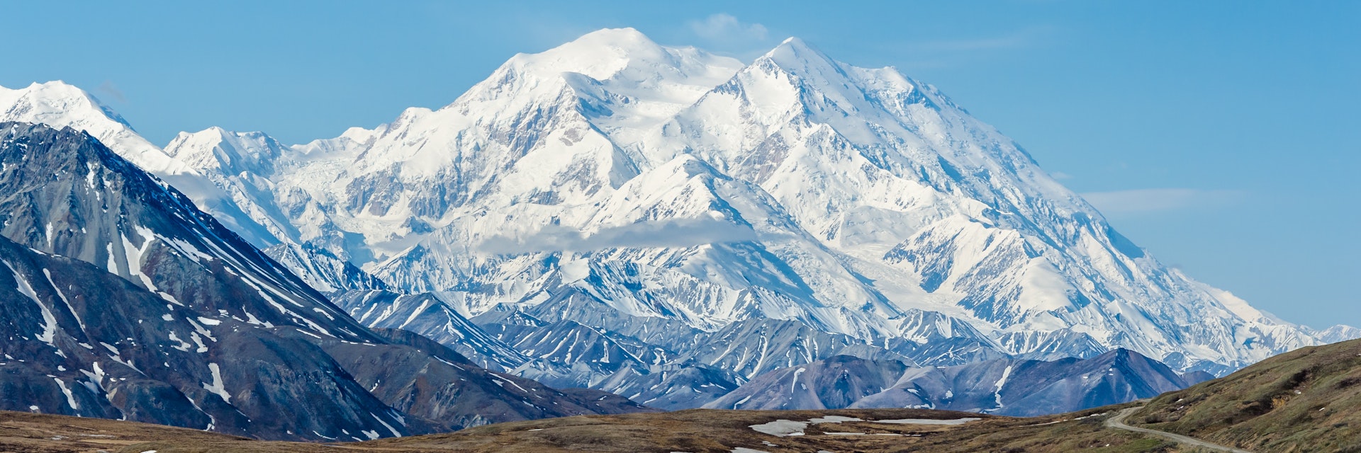 DENALI NATIONAL PARK, ALASKA, USA - JUNE 9 2013: Mt McKinley on a clear day on June 9 2013 in Alaska.  Mt McKinley is the highest mountain in North America and on August 28 2015 was renamed to Denali.
389540554
outdoor, snowy, clear, natural, park, national, day, dramatic, glacier, summer, tundra, denali, range, mckinley, mt, blue, wilderness, mountain, sky, scenic, snow, wild, nature, pretty, alaska, landscape