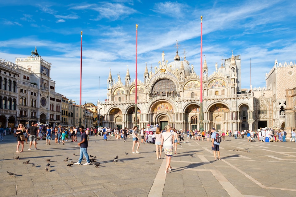 VENICE, ITALY - JULY 27,2017 : St Mark's Square in Venice on a sunny summer day
727212772
ancient, architecture, art, attraction, basilica, beautiful, building, byzantine, cathedral, catholic, christian, church, city, cultural, culture, destination, europe, european, famous, historic, history, holiday, italian, italy, landmark, mediterranean, old, people, person, piazza, pigeon, religion, religious, romantic, saint mark, saint marks basilica, saint marks square, san marco, sightseeing, square, st mark, st marks, st marks square, summer, tourism, tourist, travel, vacation, venetian, venice