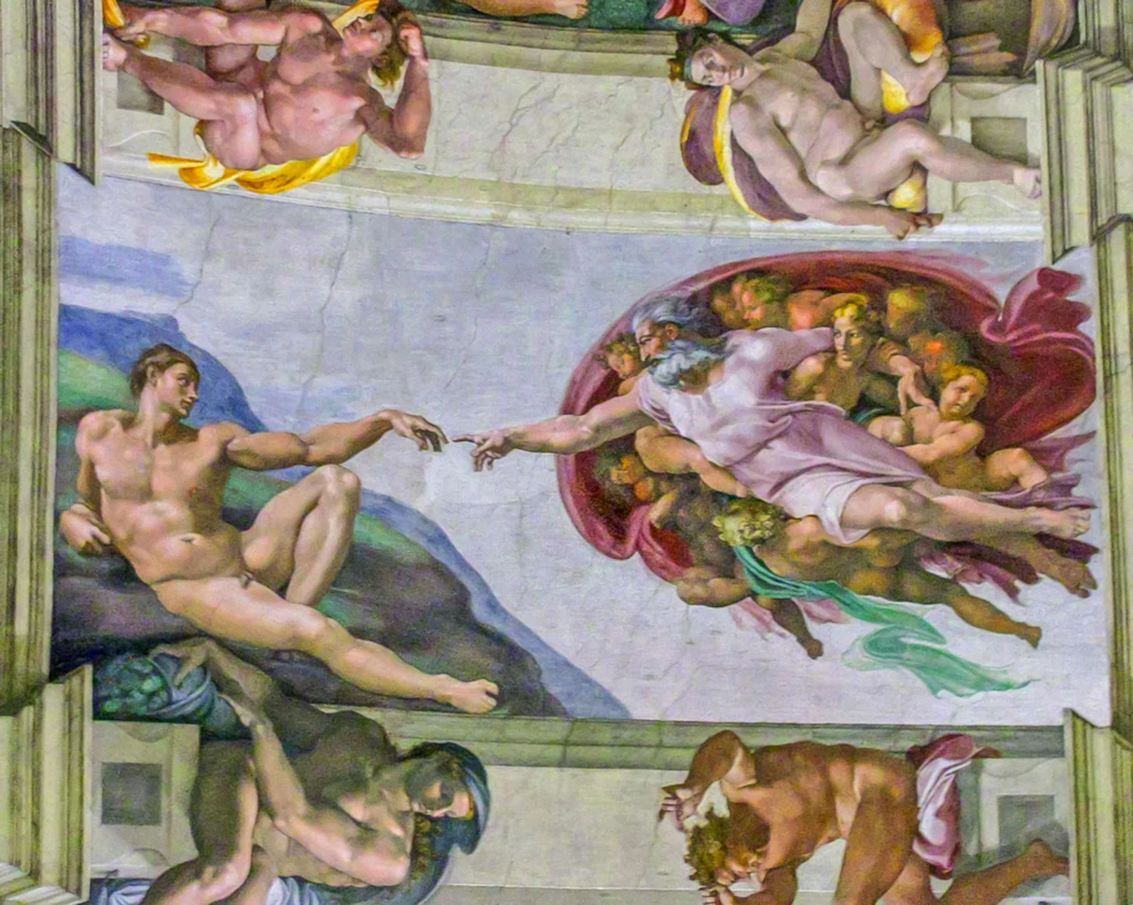 Michelangelo's God Creating Adam in the Sistine Chapel of the Vatican City A famous painting in which God reaches out his finger to meet the finger of a man, Adam