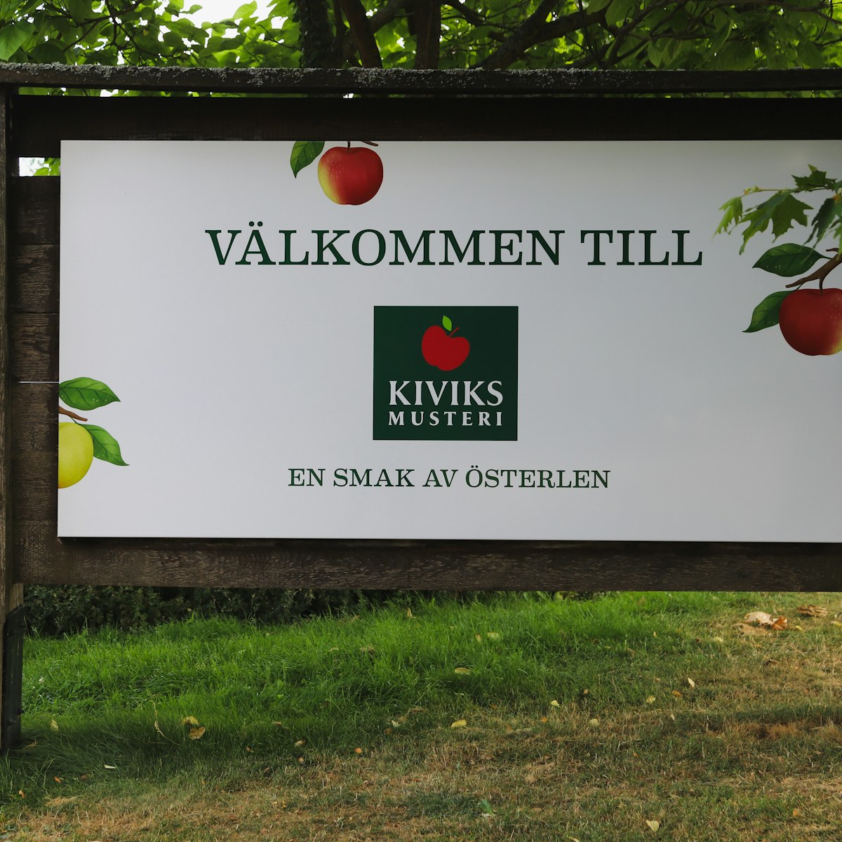 Welcome sign at Kiviks Musteri in Sweden.