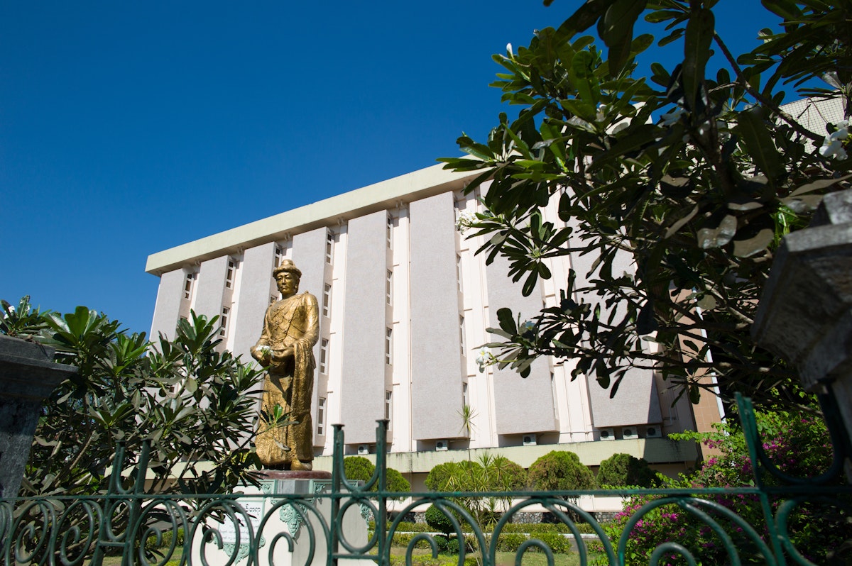 The statue of Statue of King Anawratha and the exterior of National Museum of Myanmar.