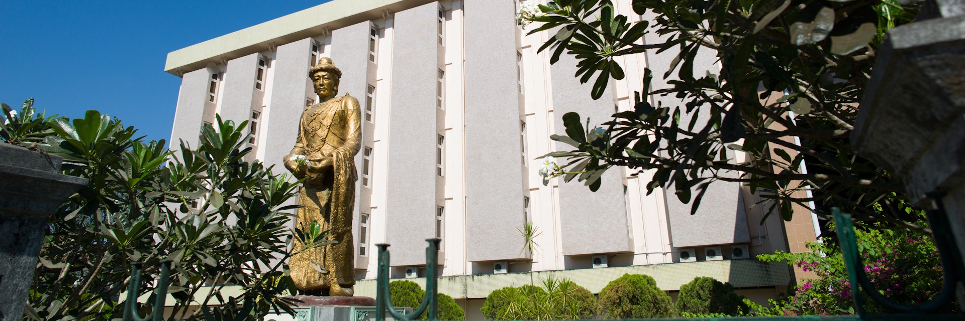The statue of Statue of King Anawratha and the exterior of National Museum of Myanmar.