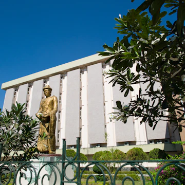 The statue of Statue of King Anawratha and the exterior of National Museum of Myanmar.