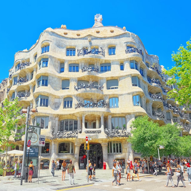 Barcelona, Spain - June 12, 2017 : Casa Mila popularly known as La Pedrera or open quarry, a reference to its unconventional rough-hewn appearance, i