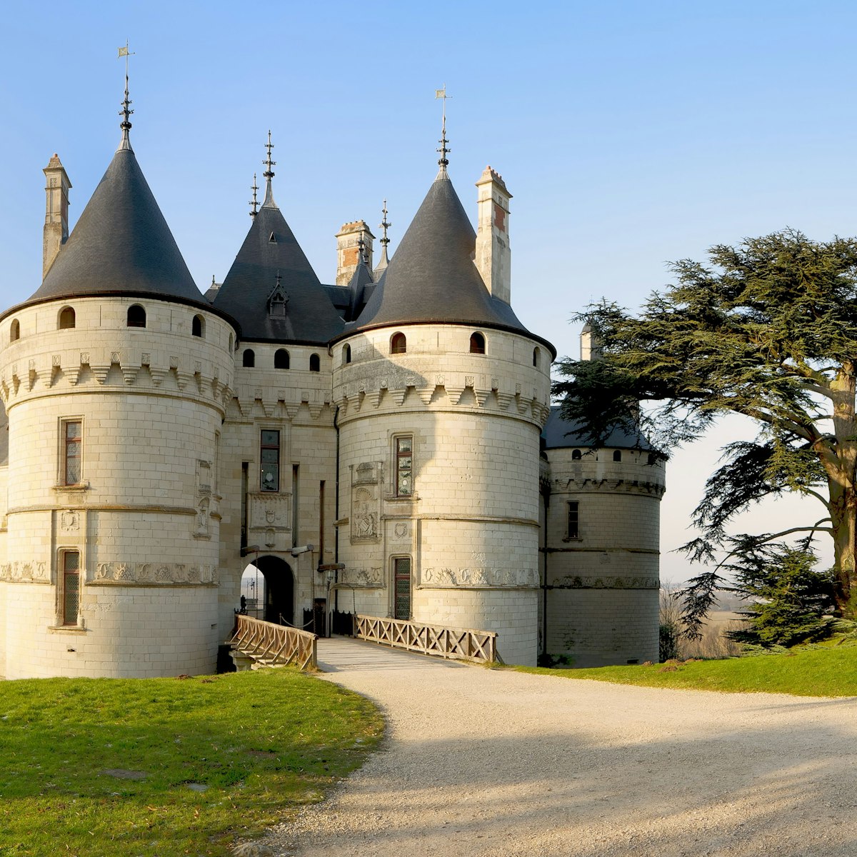 Chaumont Castle in Loire Valley France - Panoramic wide view to the entrance and the garden at sunrise with trees, grass under blue sky;,,Château de Chaumont-sur-Loire,,Shutterstock ID 1467775043; your: Bridget Brown; gl: 65050; netsuite: Online Editorial; full: POI Image Update