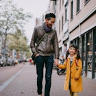 Japanese father and mixed race young girl holding hands and walking on street in Amsterdam, Netherlands
1183025558
A man and his daughter walking down the street in Amsterdam while holding hands.
