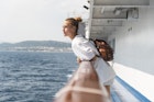 1340986147
casual, female, vessel, wanderlust, woman
A young woman leaning on a railing on the outer deck of a ferry in Croatia