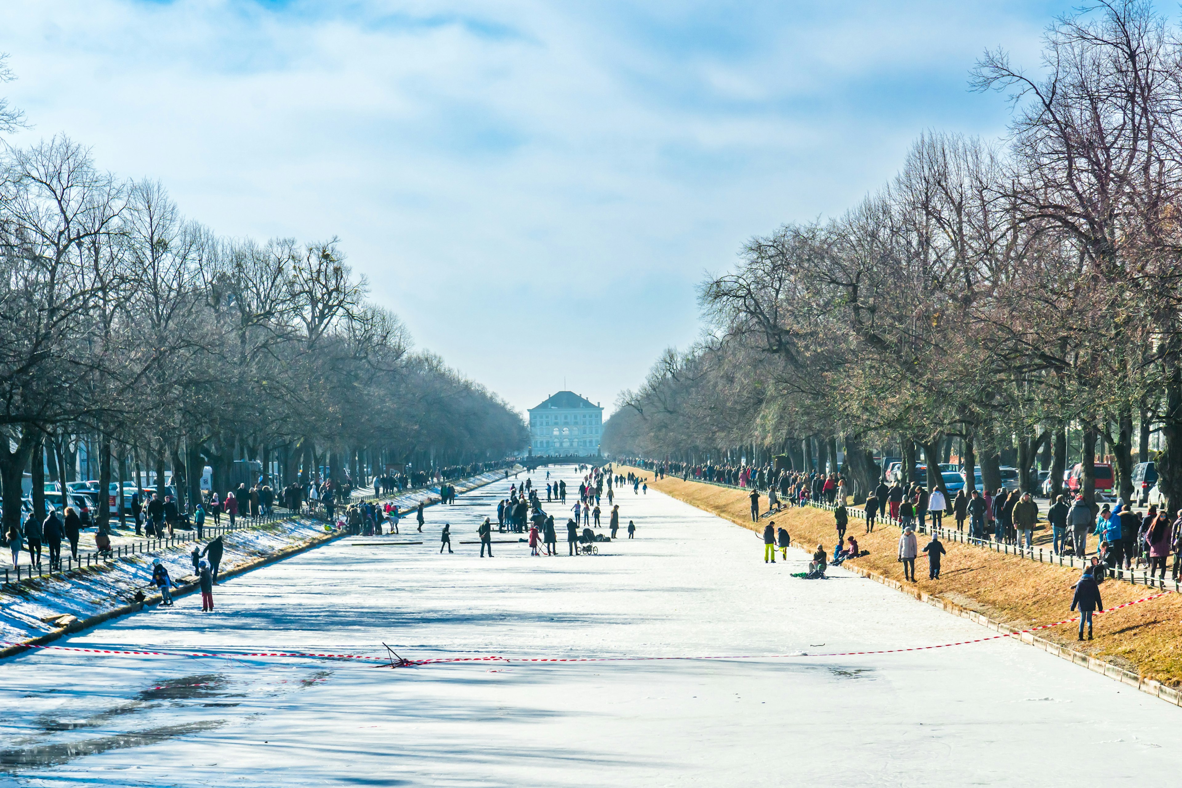 People curling on a frozen canal on a very cold winter's day