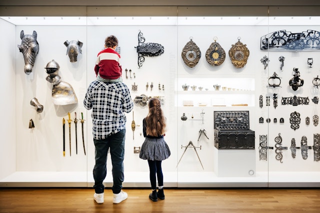 A family explores a museum together.