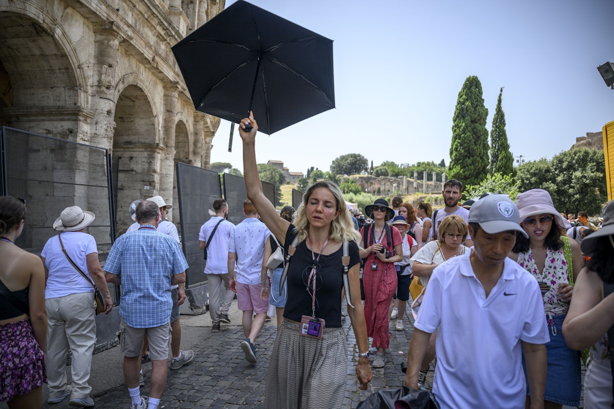 ROME, ITALY - JULY 17: A woman uses an umbrella for shade during an ongoing heat wave with temperatures reaching 44 degrees, at Colosseo area (Colosseum), on July 17, 2023 in Rome, Italy. The government has issued red alerts for 16 cities due to the current heatwave, which the Italian Meteorological Society named Cerberus, the mythical creature who guarded the gates of the underworld. Many places in Italy have seen successive days over 40C. (Photo by Antonio Masiello/Getty Images)
1538005086