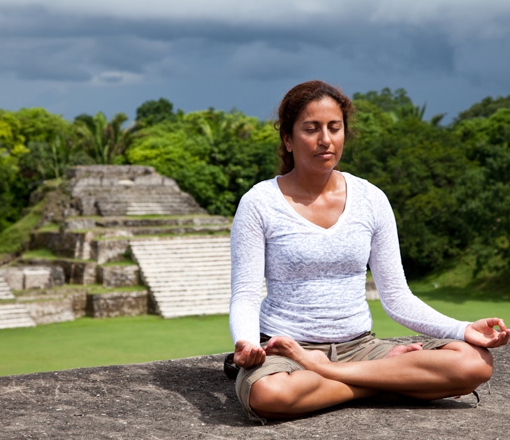 Beautiful Hispanic woman doing yoga at the Mayan ruins in Belize
184362436
Altun Ha, Serene People, Travel, Ancient Civilization, Tourism, Stone - Object, Pyramid Shape, Cloudscape, Women, Stone Material, Archaeology, Steps, 35-39 Years, Meditating, Social History, Mayan, Scenics, North American Tribal Culture, Indigenous Culture, One Person, Indian Culture, Religion, Tall - High, Ruined, History, The Past, Journey, Relaxation, Spirituality, Tranquil Scene, Pyramid, Ancient, Old, Cultures, Famous Place, High Up, Architecture, Nature, Yoga, Brown Hair, People, Belize, Central America, Tree, Tropical Rainforest, Earth, Cloud - Sky, Sky, Rain, Storm, Staircase, Temple - Building, Monument, Old Ruin, Built Structure