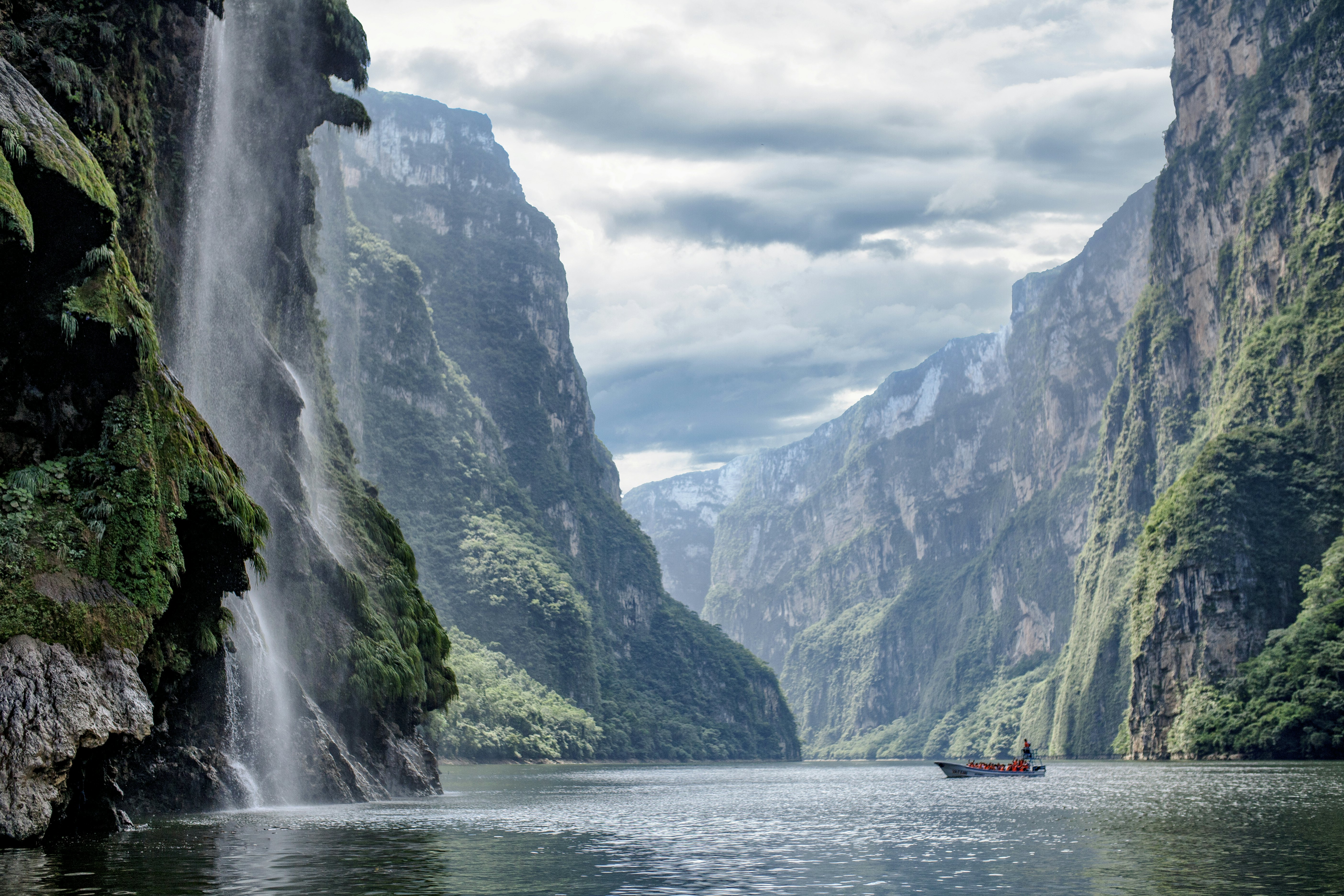 Christmas Tree Waterfall, or Cascada Arbol de Navidad, on the left in Sumidero Canyon.