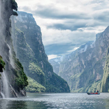 Christmas Tree Waterfall, or Cascada Arbol de Navidad, on the left in Sumidero Canyon.