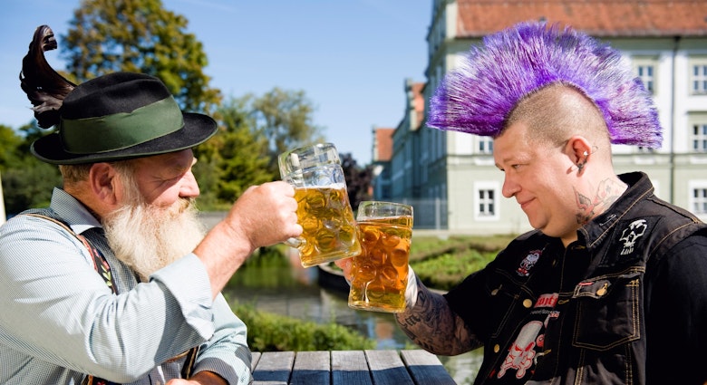 93225459
30-34 years, 35-39 years, 65-69 years, Bavaria, Caucasian, Color Image, Germany, Horizontal, Photography, Two people, Upper Bavaria, adults only, beard, beer, beer garden, beer stein, building exterior, contrasts, day, drinking, dyed hair, enjoyment, face to face, food and drink, friendship, grey hair, head and shoulders, holding, individuality, leisure, lifestyles, mid adult men, mohawk, only men, outdoors, purple, refreshment, relaxation, senior men, series, side view, sitting, tattoo, toast, togetherness, traditional clothing, traditionally german