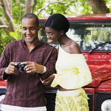 93258912
barbados, adventure, african ethnicity, boyfriend, camera, car, color image, day, digital camera, enjoying, front view, girlfriend, happy, heterosexual couple, horizontal, journey, leisure activity, looking down, man, memories, nature, outdoors, people, photography, recreation, road trip, smiling, standing, technology, together, transportation, travel, two people, vacation, viewing, waist up, woman, young adult, young couple, young men, young women, 25-29 years
A black couple standing in front of their jeep and looks at a digital camera